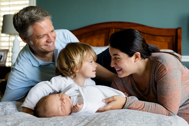 CC0 Public Domain  FAQ-family kids newborn together