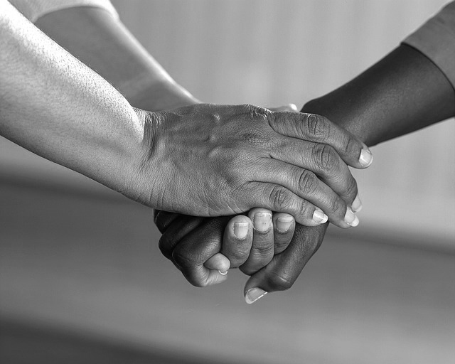 CC0 Public Domain-clasped hands – Copy